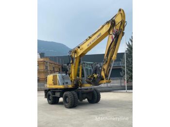 Pyöräalustainen kaivinkone NEW HOLLAND