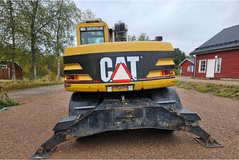 Pyöräalustainen kaivinkone Caterpillar M312 Engcon EC20 tiltrotator