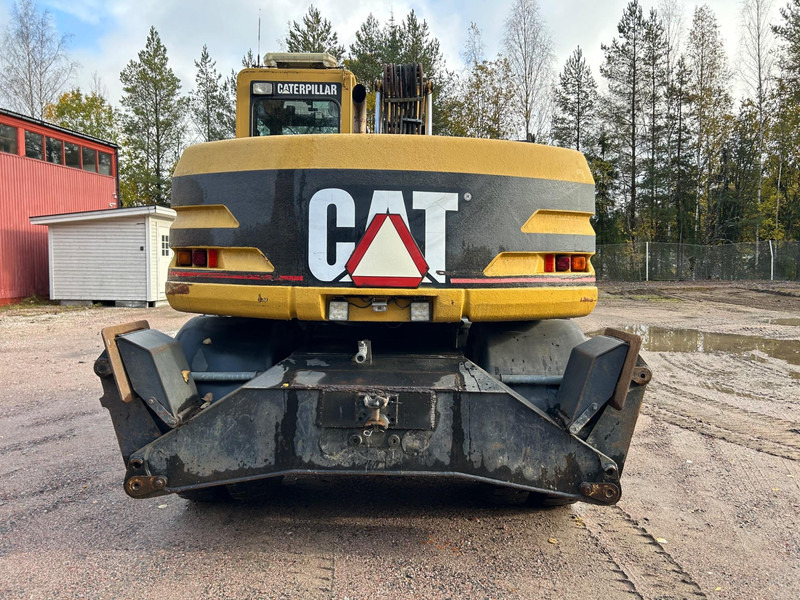 Pyöräalustainen kaivinkone Caterpillar M312 Engcon EC20 tiltrotator
