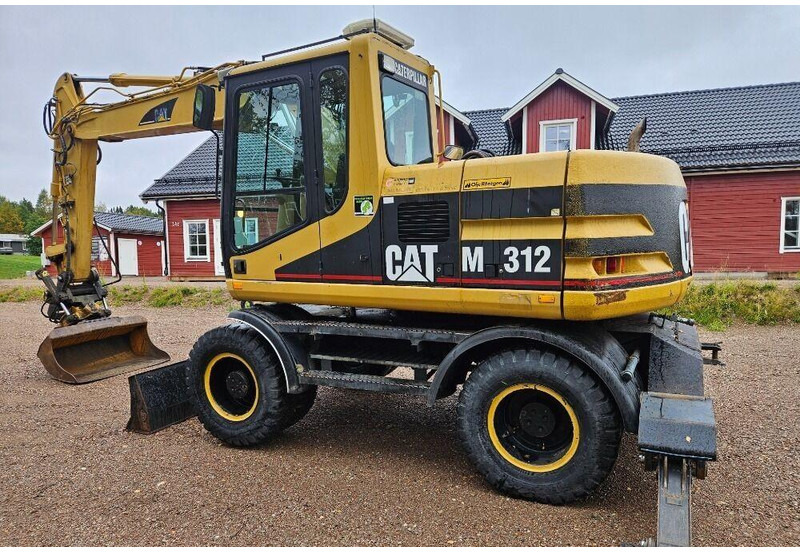 Pyöräalustainen kaivinkone Caterpillar M312 Engcon EC20 tiltrotator