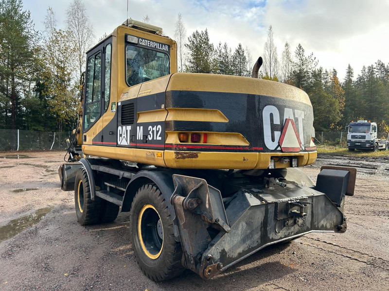 Pyöräalustainen kaivinkone Caterpillar M312 Engcon EC20 tiltrotator