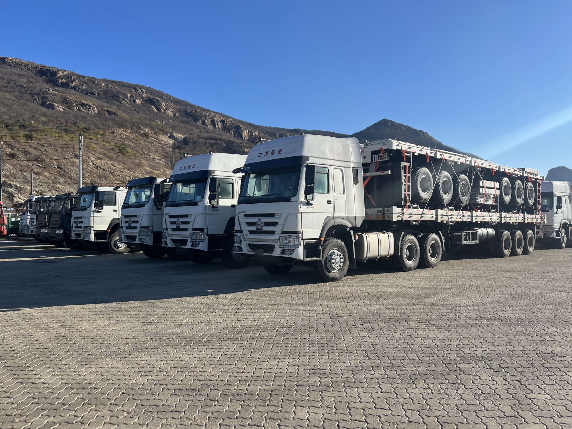 Qingdao Higher Weight Trade Co. LTD - Kuorma-autot SINOTRUK - ilmastointilaite undefined: kuva Qingdao Higher Weight Trade Co. LTD - Kuorma-autot SINOTRUK - ilmastointilaite undefined