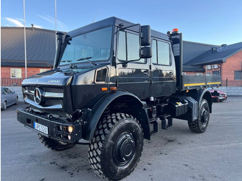 Lava-kuorma-auto UNIMOG