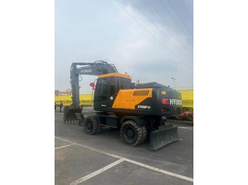 Pyöräalustainen kaivinkone HYUNDAI R210
