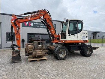 Pyöräalustainen kaivinkone TEREX
