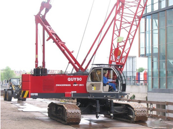 Telaketjunosturi Fushun Quy 90 C: kuva Telaketjunosturi Fushun Quy 90 C