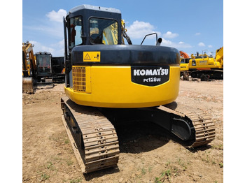 Telakaivukone Komatsu PC128US: kuva Telakaivukone Komatsu PC128US