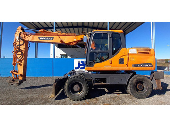 Pyöräalustainen kaivinkone DOOSAN DX140W-3