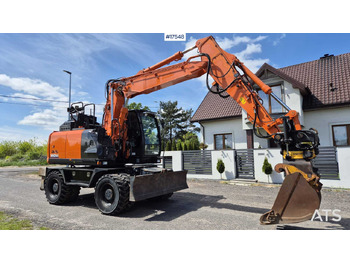Pyöräalustainen kaivinkone HITACHI ZX140W-6