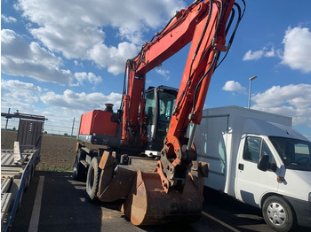 Pyöräalustainen kaivinkone O&K