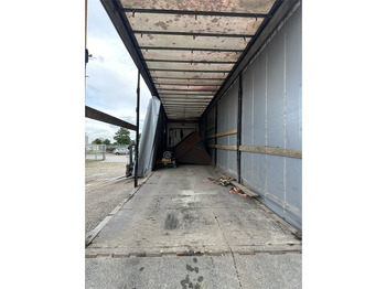 Apuvaunu puoliperävaunu Schmitz Cargobull Machine transport trailer with bag ramp: kuva Apuvaunu puoliperävaunu Schmitz Cargobull Machine transport trailer with bag ramp