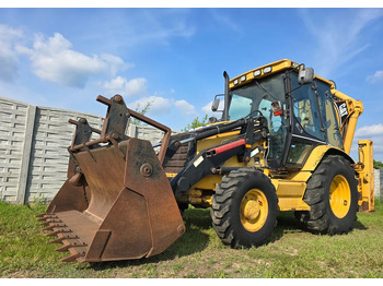 Kaivuri-trukki CATERPILLAR