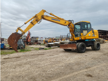 Pyöräalustainen kaivinkone KOMATSU PW140