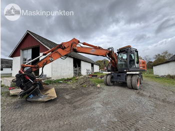 Pyöräalustainen kaivinkone HITACHI ZX140W-3