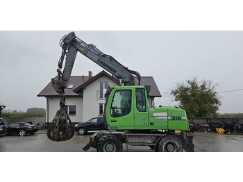 Pyöräalustainen kaivinkone LIEBHERR A 316