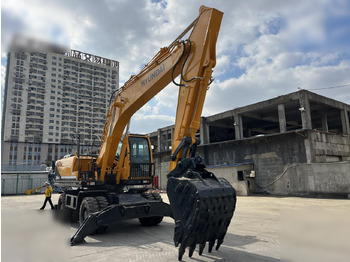 Pyöräalustainen kaivinkone HYUNDAI ROBEX 210W-9: kuva Pyöräalustainen kaivinkone HYUNDAI ROBEX 210W-9
