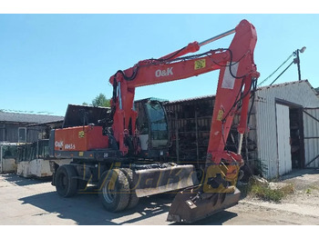 Pyöräalustainen kaivinkone O&K