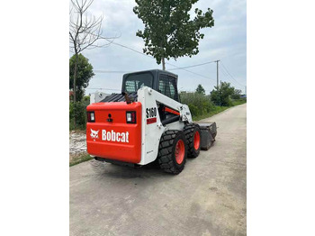 Liukuohjattu kuormaaja USED BOBCAT S160 Skid-steer Loader Bobcat S160 Carry Sweeper with Very Good Performance Is for Sale at a Low Price.: kuva Liukuohjattu kuormaaja USED BOBCAT S160 Skid-steer Loader Bobcat S160 Carry Sweeper with Very Good Performance Is for Sale at a Low Price.