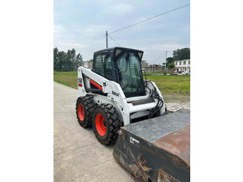 Liukuohjattu kuormaaja USED BOBCAT S160 Skid-steer Loader Bobcat S160 Carry Sweeper with Very Good Performance Is for Sale at a Low Price.: kuva Liukuohjattu kuormaaja USED BOBCAT S160 Skid-steer Loader Bobcat S160 Carry Sweeper with Very Good Performance Is for Sale at a Low Price.