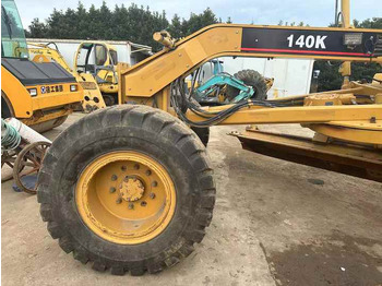 Uusi Tiehöylä Used Caterpillar CAT 140k Land Road Motor Grader CAT140k Used Grader Cheap Price for Sale: kuva Uusi Tiehöylä Used Caterpillar CAT 140k Land Road Motor Grader CAT140k Used Grader Cheap Price for Sale