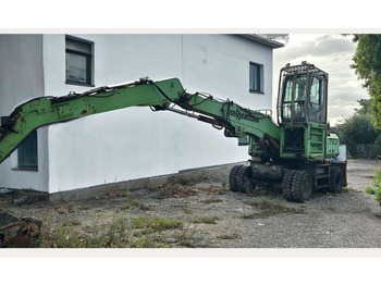 Materiaalinkäsittelykone SENNEBOGEN