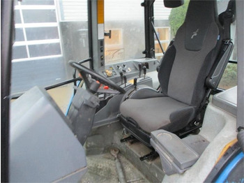 Traktori New Holland 7840 SLE, med rigtig god dæk montering og knap på: kuva Traktori New Holland 7840 SLE, med rigtig god dæk montering og knap på