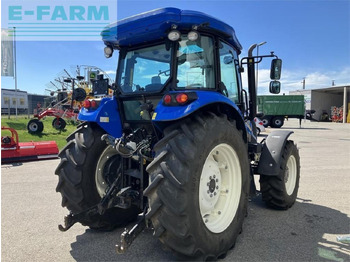 Traktori New Holland td5.85: kuva Traktori New Holland td5.85 Traktori New Holland td5.85: kuva Traktori New Holland td5.85