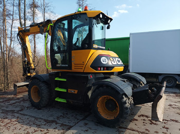 Pyöräalustainen kaivinkone JCB