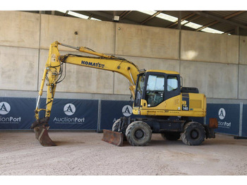 Pyöräalustainen kaivinkone KOMATSU PW140