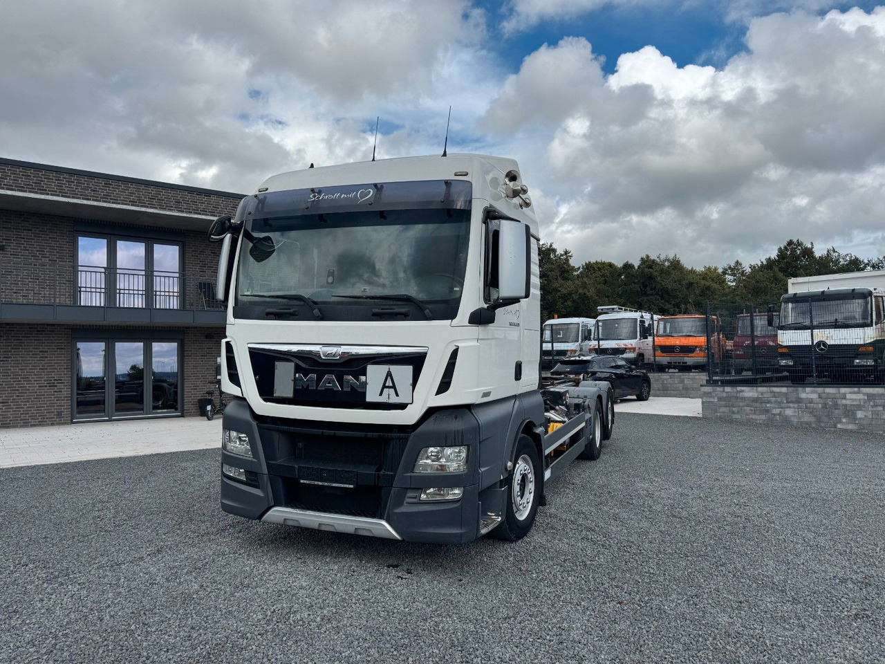 MAN TGX 26.520 D38 Abrollkipper Multilift - Koukkulava kuorma-auto: kuva MAN TGX 26.520 D38 Abrollkipper Multilift - Koukkulava kuorma-auto MAN TGX 26.520 D38 Abrollkipper Multilift - Koukkulava kuorma-auto: kuva MAN TGX 26.520 D38 Abrollkipper Multilift - Koukkulava kuorma-auto