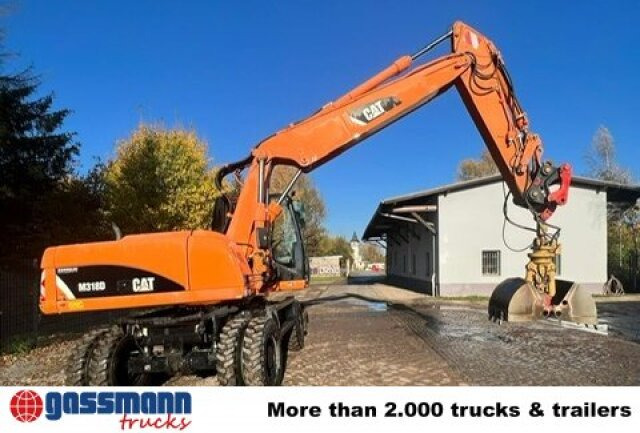 CAT M318D Mobilbagger - Pyöräalustainen kaivinkone: kuva CAT M318D Mobilbagger - Pyöräalustainen kaivinkone CAT M318D Mobilbagger - Pyöräalustainen kaivinkone: kuva CAT M318D Mobilbagger - Pyöräalustainen kaivinkone