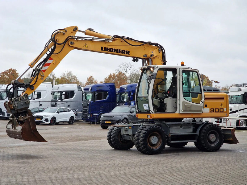 Liebherr A900C - 95 KW - Central Greasing - - Pyöräalustainen kaivinkone: kuva Liebherr A900C - 95 KW - Central Greasing - - Pyöräalustainen kaivinkone Liebherr A900C - 95 KW - Central Greasing - - Pyöräalustainen kaivinkone: kuva Liebherr A900C - 95 KW - Central Greasing - - Pyöräalustainen kaivinkone