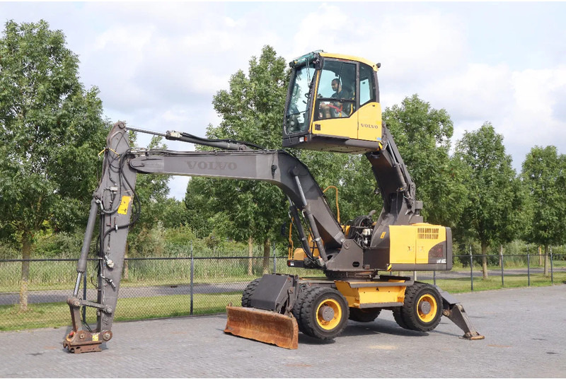 Volvo EW160 C | QUICK COUPLER | ELEVATING CABIN | UMSCHLAG - Materiaalinkäsittelykone: kuva Volvo EW160 C | QUICK COUPLER | ELEVATING CABIN | UMSCHLAG - Materiaalinkäsittelykone Volvo EW160 C | QUICK COUPLER | ELEVATING CABIN | UMSCHLAG - Materiaalinkäsittelykone: kuva Volvo EW160 C | QUICK COUPLER | ELEVATING CABIN | UMSCHLAG - Materiaalinkäsittelykone