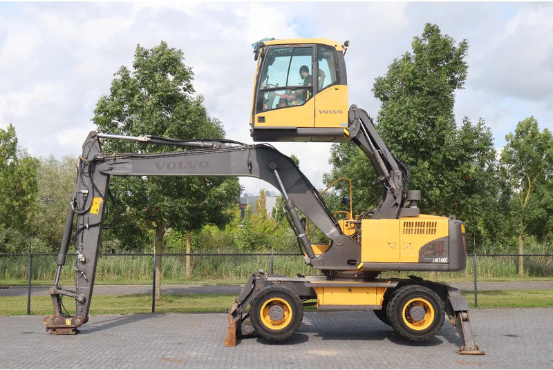 Volvo EW160 C | QUICK COUPLER | ELEVATING CABIN | UMSCHLAG - Materiaalinkäsittelykone: kuva Volvo EW160 C | QUICK COUPLER | ELEVATING CABIN | UMSCHLAG - Materiaalinkäsittelykone Volvo EW160 C | QUICK COUPLER | ELEVATING CABIN | UMSCHLAG - Materiaalinkäsittelykone: kuva Volvo EW160 C | QUICK COUPLER | ELEVATING CABIN | UMSCHLAG - Materiaalinkäsittelykone