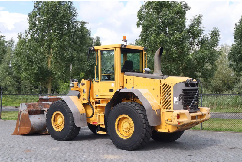 Volvo L70E | BUCKET | QUICK COUPLER | EXTRA FUNCT | AIRCO - Pyöräkuormaaja: kuva Volvo L70E | BUCKET | QUICK COUPLER | EXTRA FUNCT | AIRCO - Pyöräkuormaaja Volvo L70E | BUCKET | QUICK COUPLER | EXTRA FUNCT | AIRCO - Pyöräkuormaaja: kuva Volvo L70E | BUCKET | QUICK COUPLER | EXTRA FUNCT | AIRCO - Pyöräkuormaaja