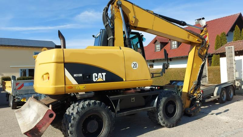 Caterpillar M313D VAH - Pyöräalustainen kaivinkone: kuva Caterpillar M313D VAH - Pyöräalustainen kaivinkone Caterpillar M313D VAH - Pyöräalustainen kaivinkone: kuva Caterpillar M313D VAH - Pyöräalustainen kaivinkone