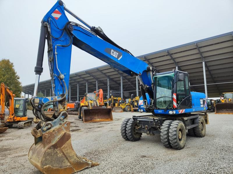 Caterpillar M322D VAH - Pyöräalustainen kaivinkone: kuva Caterpillar M322D VAH - Pyöräalustainen kaivinkone Caterpillar M322D VAH - Pyöräalustainen kaivinkone: kuva Caterpillar M322D VAH - Pyöräalustainen kaivinkone