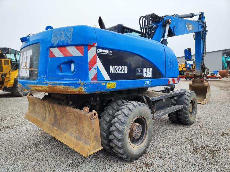 Caterpillar M322D VAH - Pyöräalustainen kaivinkone: kuva Caterpillar M322D VAH - Pyöräalustainen kaivinkone Caterpillar M322D VAH - Pyöräalustainen kaivinkone: kuva Caterpillar M322D VAH - Pyöräalustainen kaivinkone