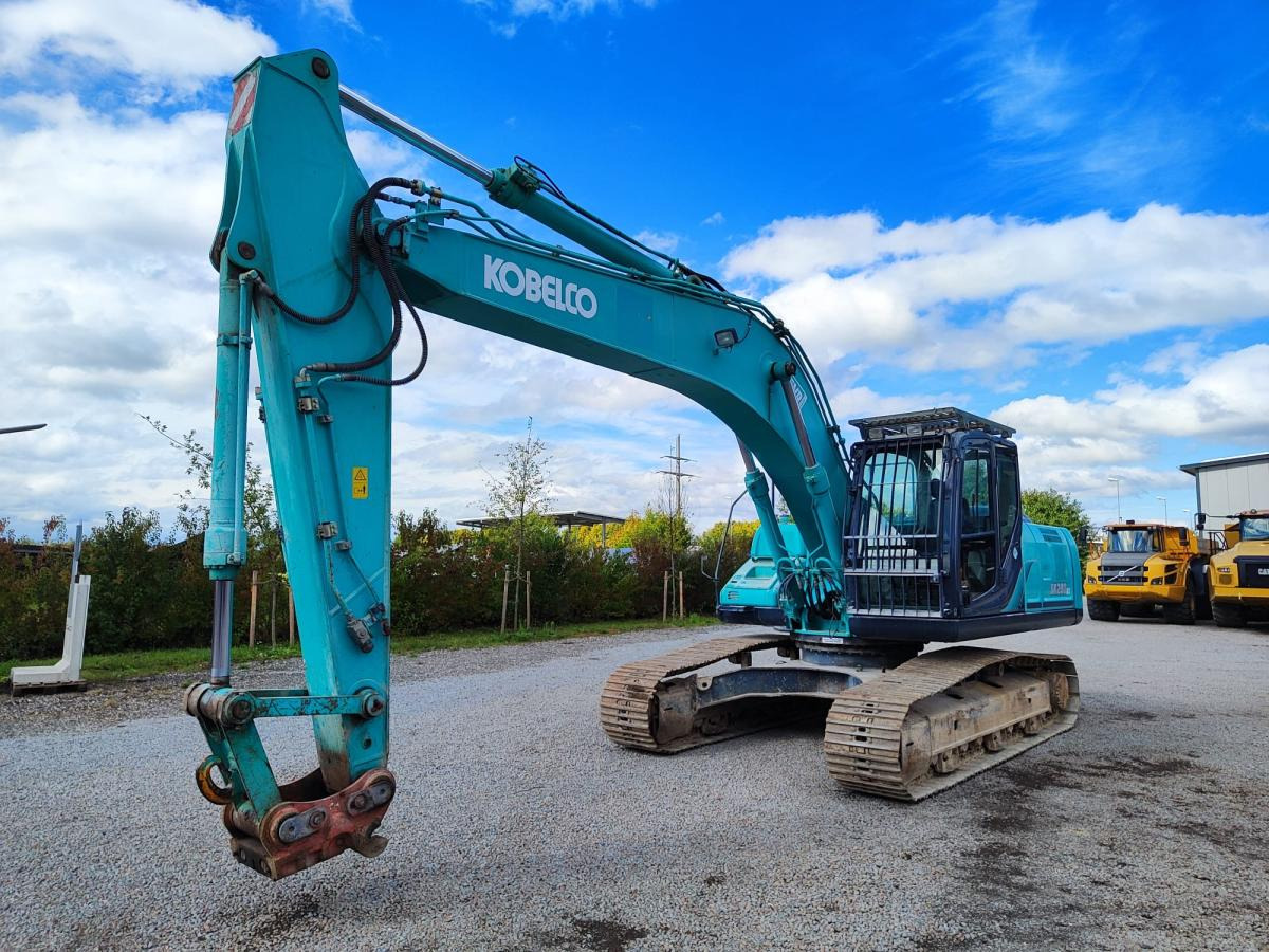 Kobelco SK260NLC-9 - Telakaivukone: kuva Kobelco SK260NLC-9 - Telakaivukone Kobelco SK260NLC-9 - Telakaivukone: kuva Kobelco SK260NLC-9 - Telakaivukone