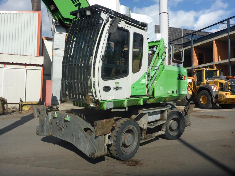 Sennebogen 818 - Materiaalinkäsittelykone: kuva Sennebogen 818 - Materiaalinkäsittelykone Sennebogen 818 - Materiaalinkäsittelykone: kuva Sennebogen 818 - Materiaalinkäsittelykone