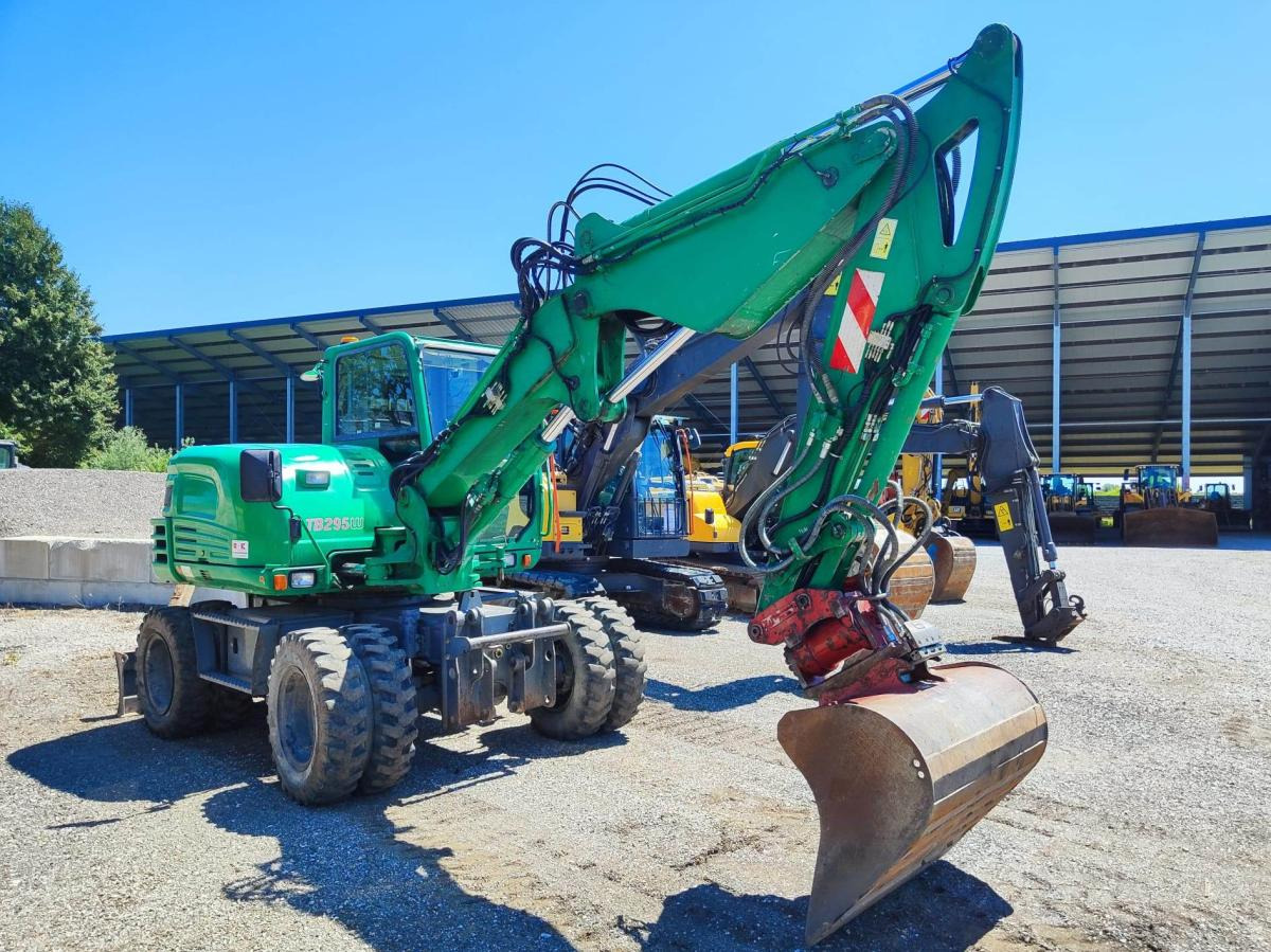 Takeuchi TB295W - Pyöräalustainen kaivinkone: kuva Takeuchi TB295W - Pyöräalustainen kaivinkone Takeuchi TB295W - Pyöräalustainen kaivinkone: kuva Takeuchi TB295W - Pyöräalustainen kaivinkone