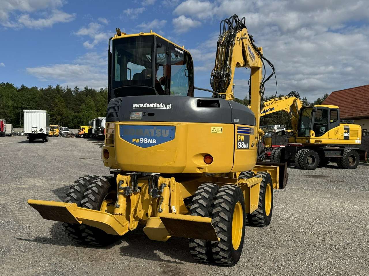 Pyöräalustainen kaivinkone Komatsu PW 98 MR 8 Pług + Podpory 10ton Szybkozłącze: kuva Pyöräalustainen kaivinkone Komatsu PW 98 MR 8 Pług + Podpory 10ton Szybkozłącze