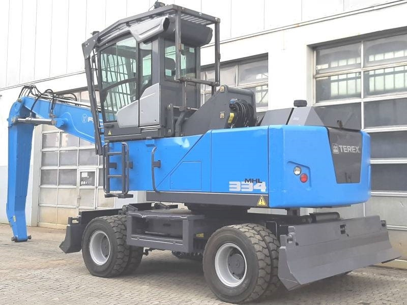 Fuchs MHL 334 F - Materiaalinkäsittelykone: kuva Fuchs MHL 334 F - Materiaalinkäsittelykone Fuchs MHL 334 F - Materiaalinkäsittelykone: kuva Fuchs MHL 334 F - Materiaalinkäsittelykone