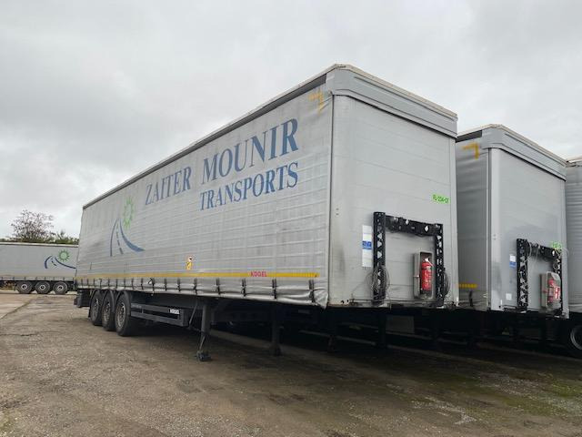 Kögel - Pressukapellipuoliperävaunu: kuva Kögel - Pressukapellipuoliperävaunu Kögel - Pressukapellipuoliperävaunu: kuva Kögel - Pressukapellipuoliperävaunu