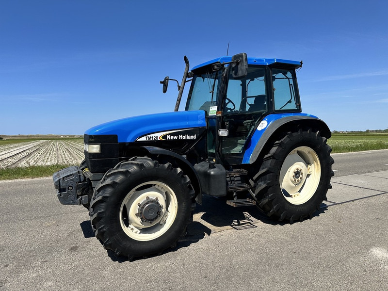 New Holland 8260 - Traktori: kuva New Holland 8260 - Traktori New Holland 8260 - Traktori: kuva New Holland 8260 - Traktori