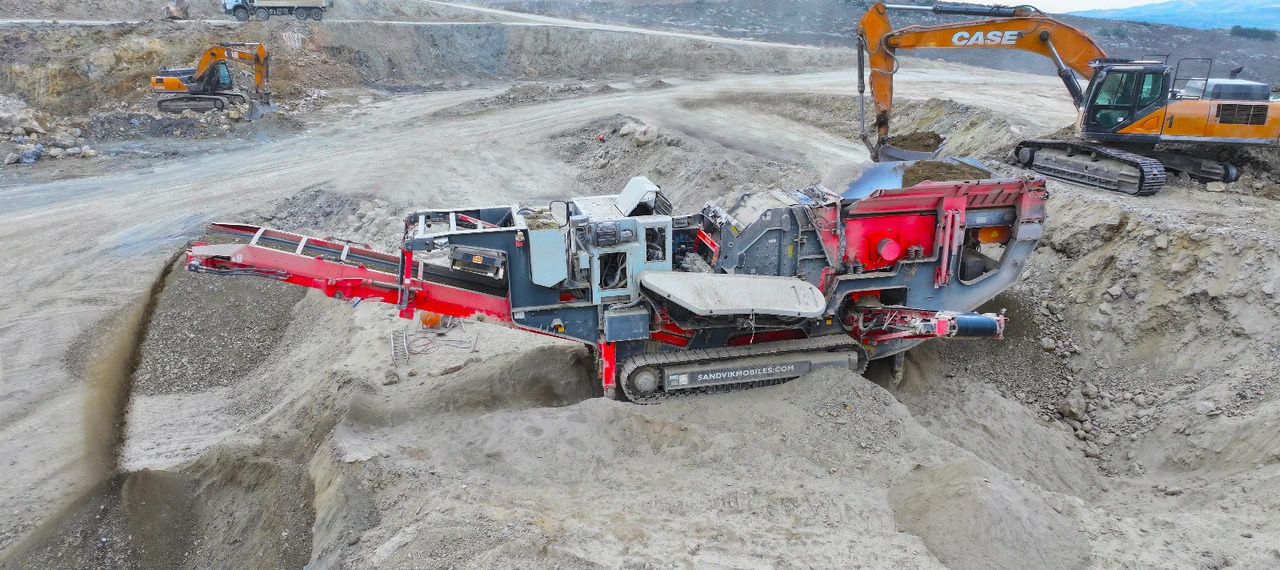 SANDVIK Mobile crusher - Mobiilimurskain: kuva SANDVIK Mobile crusher - Mobiilimurskain SANDVIK Mobile crusher - Mobiilimurskain: kuva SANDVIK Mobile crusher - Mobiilimurskain
