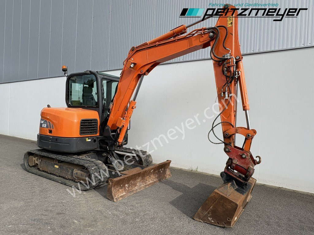 Doosan Kettenbagger DX 63-3 PowerTilt 070 , MS 03, mehrfach vorhanden - Minikuormaaja: kuva Doosan Kettenbagger DX 63-3 PowerTilt 070 , MS 03, mehrfach vorhanden - Minikuormaaja Doosan Kettenbagger DX 63-3 PowerTilt 070 , MS 03, mehrfach vorhanden - Minikuormaaja: kuva Doosan Kettenbagger DX 63-3 PowerTilt 070 , MS 03, mehrfach vorhanden - Minikuormaaja