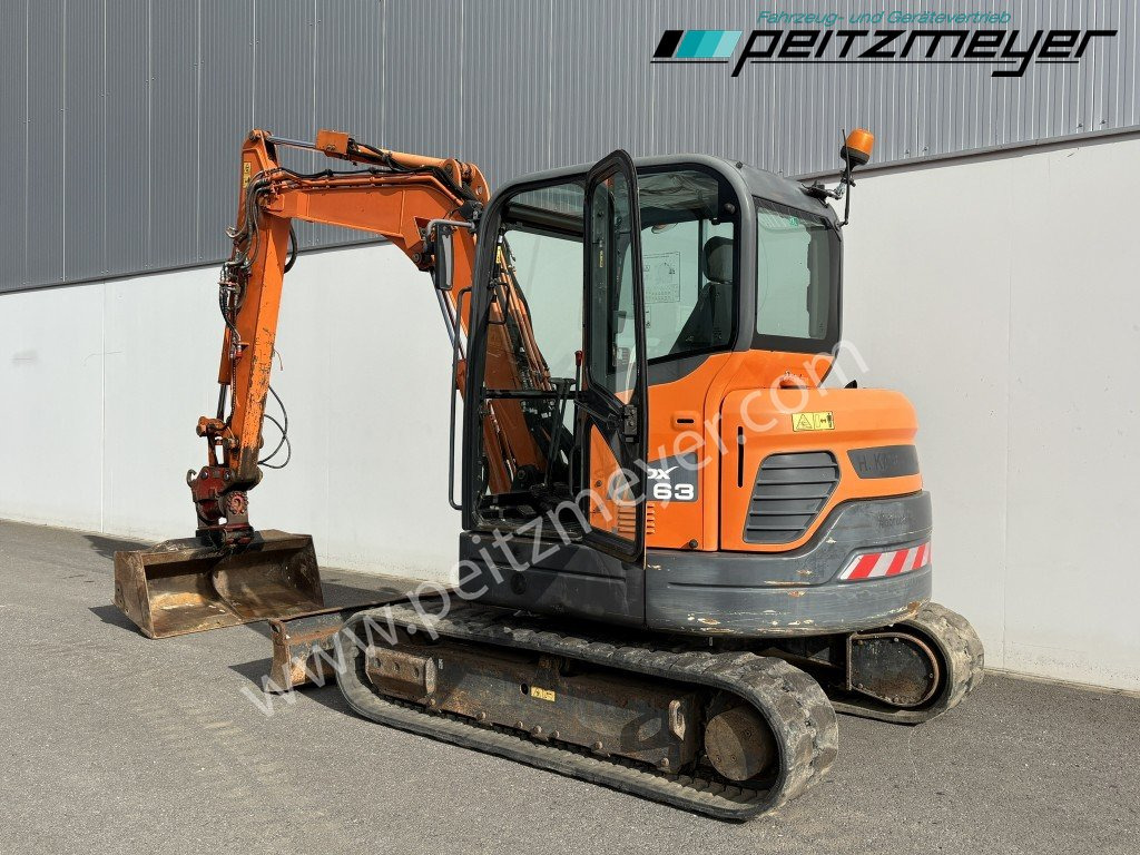 Doosan Kettenbagger DX 63-3 PowerTilt 070 , MS 03, mehrfach vorhanden - Minikuormaaja: kuva Doosan Kettenbagger DX 63-3 PowerTilt 070 , MS 03, mehrfach vorhanden - Minikuormaaja Doosan Kettenbagger DX 63-3 PowerTilt 070 , MS 03, mehrfach vorhanden - Minikuormaaja: kuva Doosan Kettenbagger DX 63-3 PowerTilt 070 , MS 03, mehrfach vorhanden - Minikuormaaja