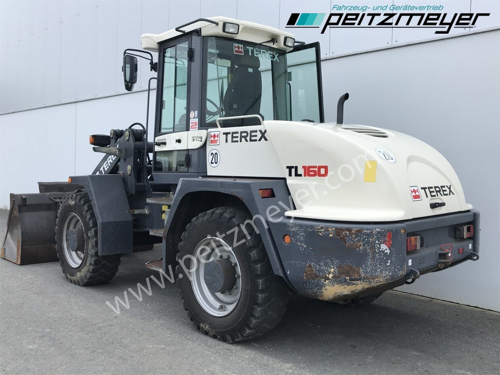 TEREX Radlader TL 160 Schaufel + Gabel - Pyöräkuormaaja: kuva TEREX Radlader TL 160 Schaufel + Gabel - Pyöräkuormaaja TEREX Radlader TL 160 Schaufel + Gabel - Pyöräkuormaaja: kuva TEREX Radlader TL 160 Schaufel + Gabel - Pyöräkuormaaja
