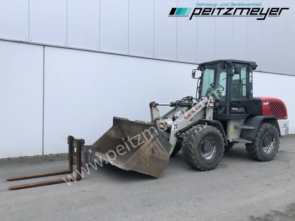 Takeuchi / Terex Radlader TW 10 (ohne Ad-Blue) - Pyöräkuormaaja: kuva Takeuchi / Terex Radlader TW 10 (ohne Ad-Blue) - Pyöräkuormaaja Takeuchi / Terex Radlader TW 10 (ohne Ad-Blue) - Pyöräkuormaaja: kuva Takeuchi / Terex Radlader TW 10 (ohne Ad-Blue) - Pyöräkuormaaja